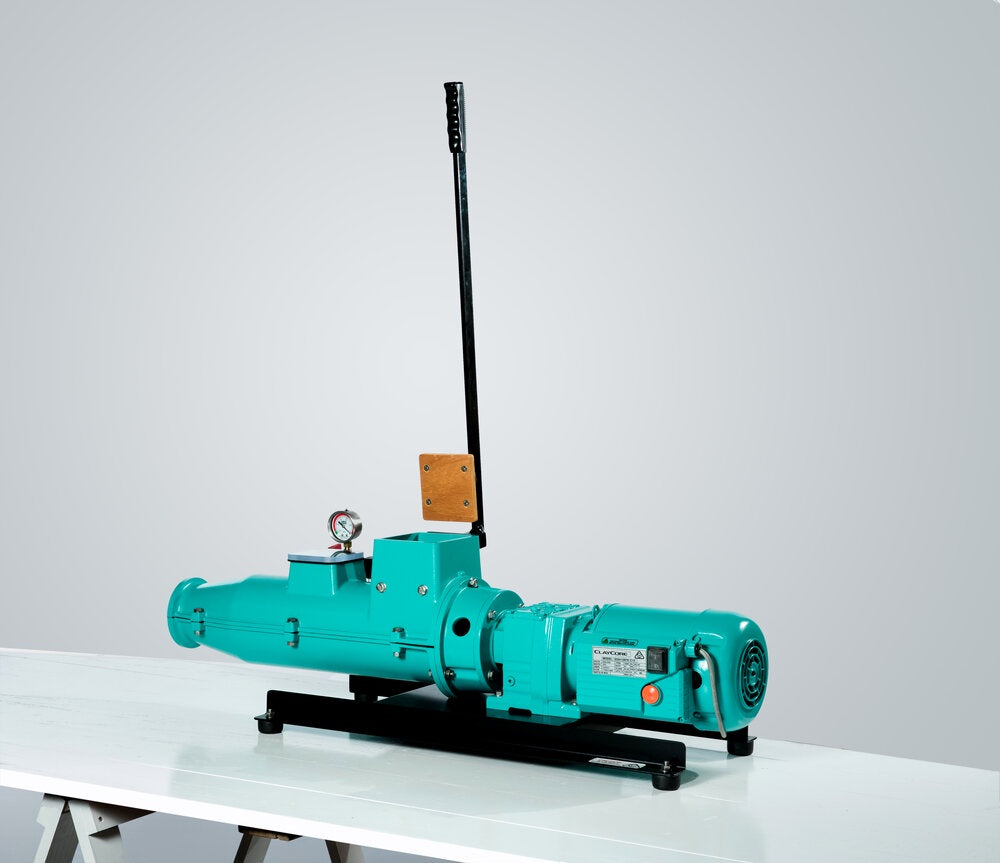 Green Venco De-airing Pugmill on table