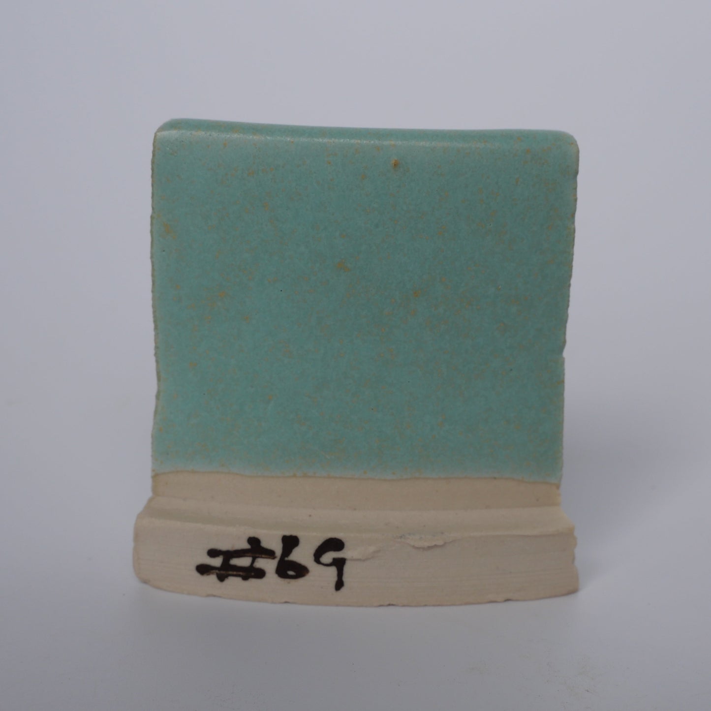 matte blue green glaze on ceramic tile River Rock Glazes Australia